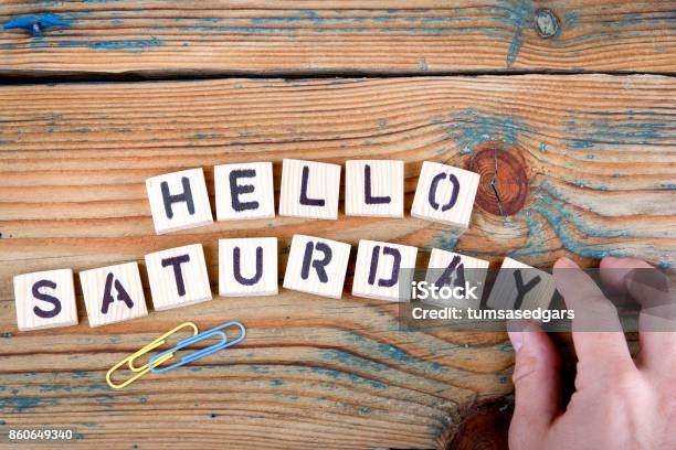 Hello Saturday Wooden Letters On The Office Desk Stock Photo - Download Image Now - Weekend Activities, Saturday, Sunday