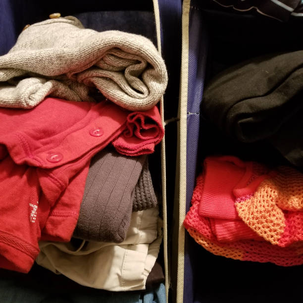 istock The small closet fulfilled with clothes 860649512
