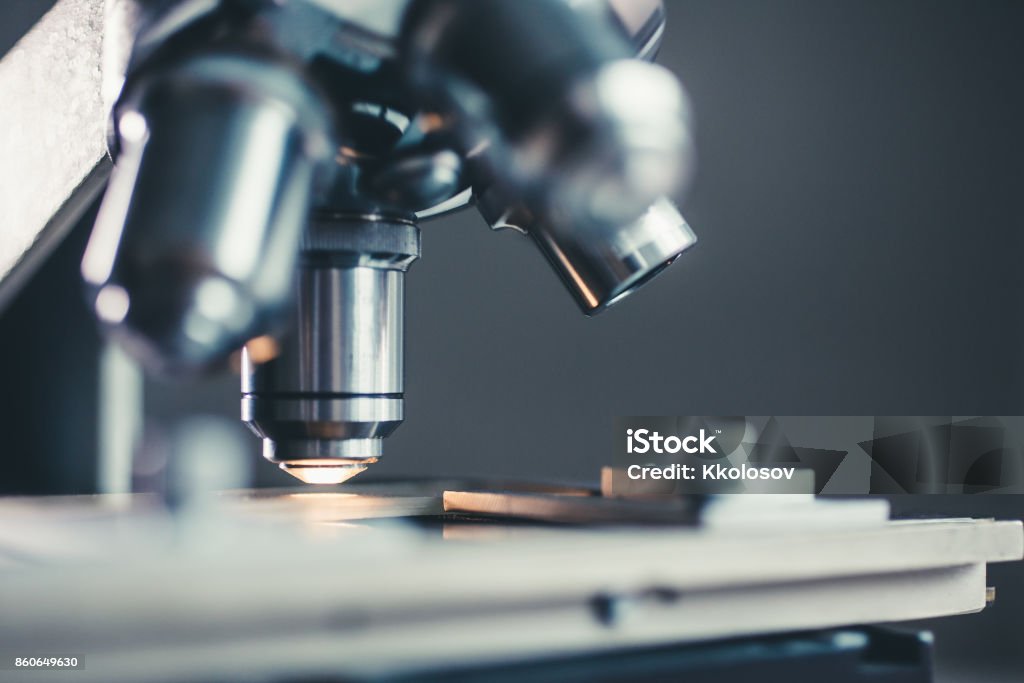 Close-up shot of microscope Close-up shot of microscope with metal lens at laboratory. Microscope Stock Photo