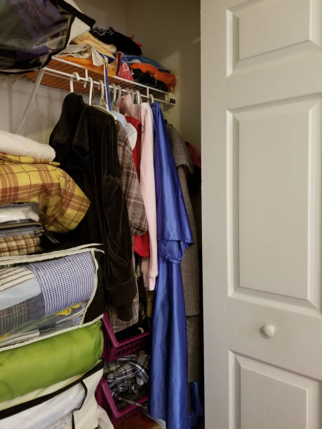 istock The small closet fulfilled with clothes 860650490