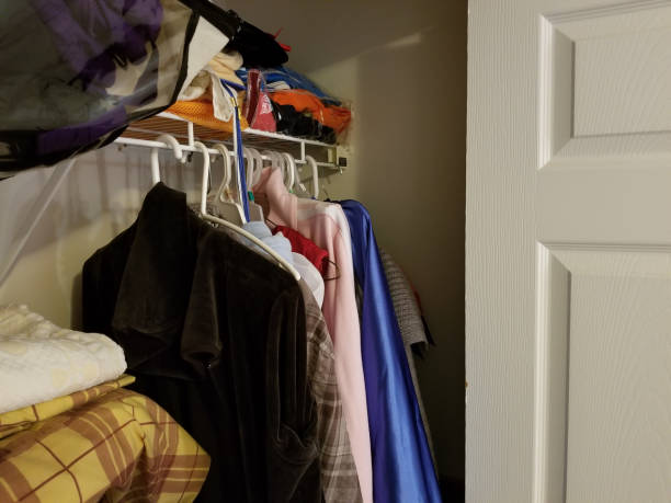 istock The small closet fulfilled with clothes 860650508