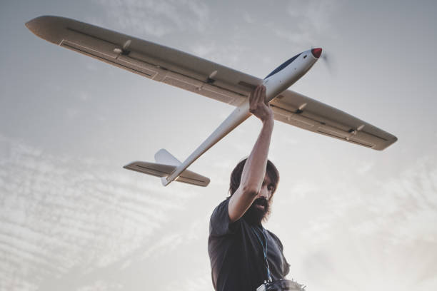 Man launches RC glider into the sky