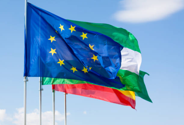 istock EU Flag with Andalusia and Spanish flags 860658426