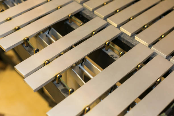 xylophone, musical percussion instruments concept - closeup on glockenspiel, marimba, balafon, semantron, pixiphone, education and orchestra concert usage, beige bars without mallets
