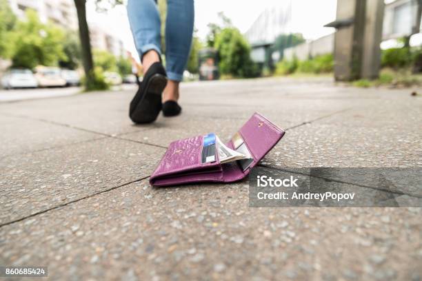Closeup Of Woman Losing His Wallet Stock Photo - Download Image Now - Lost, Wallet, Credit Card
