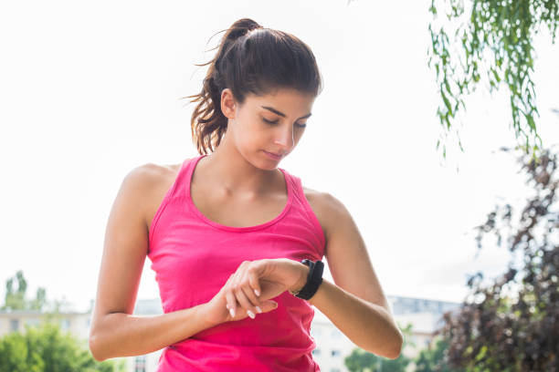 istock Sportswoman Checking Smart Watch 860688722
