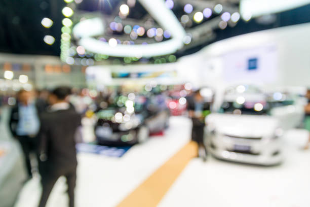Abstract blur and defocused car and motor exhibition show interior for background stock photo