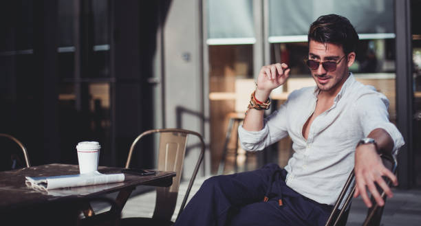 istock Man sitting in coffee shop 860700432