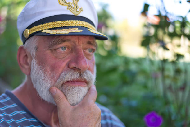 Conceived white-bearded man with a sailor's hat.