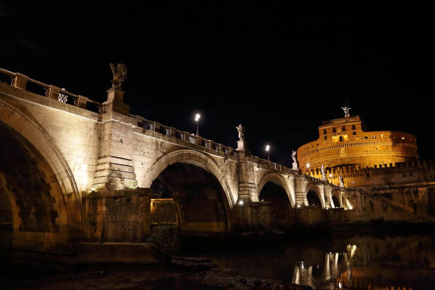 istock Rome scenic bridges at night 860701746