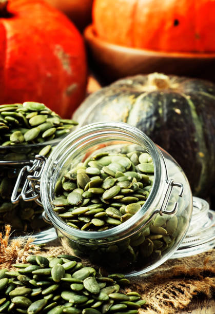 istock Raw pumpkin seeds, healthy snack, 860705192