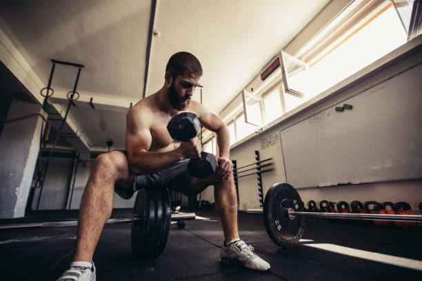 istock Dumbbell workout in the gym 860707270
