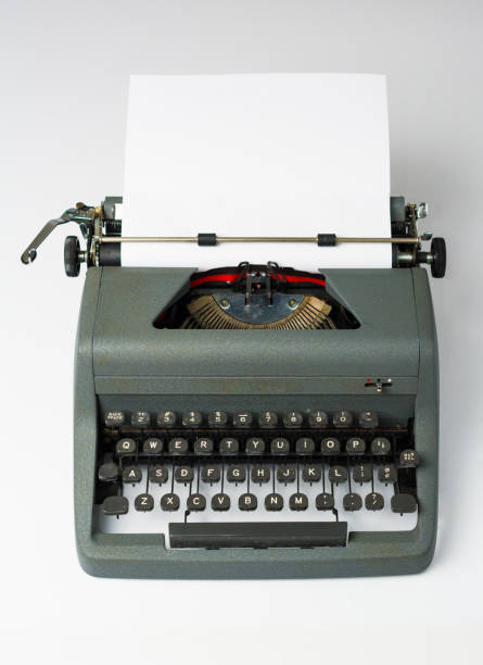istock Antique Typewriter on White Background with Paper in Perspective 860714924