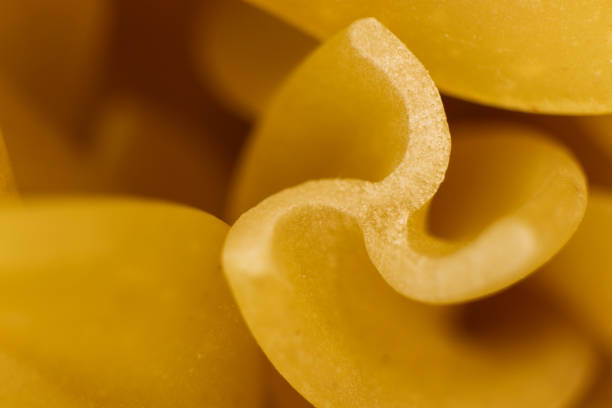Spiral Macaroni Macro Closeup. Background Texture.