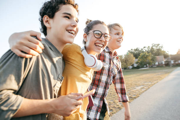 Friends having fun after school Teens having fun after school teenager back to school group of people student stock pictures, royalty-free photos & images