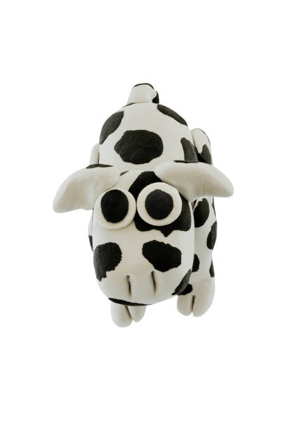 istock Plasticine cow on whie background 860721242