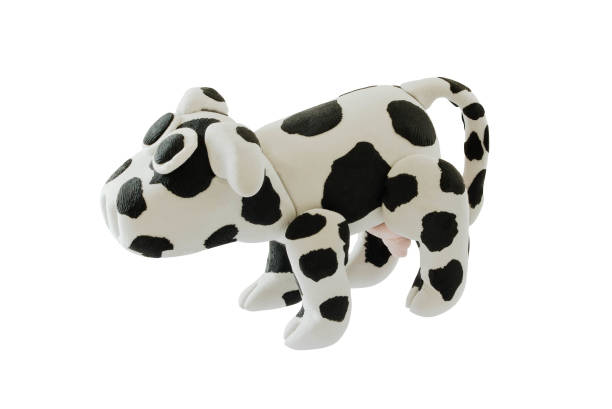 istock Plasticine cow on whie background 860721252