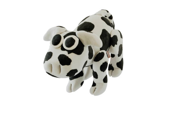 Plasticine cow on whie background Plasticine cow on whie isolated background isolated on whie stock pictures, royalty-free photos & images
