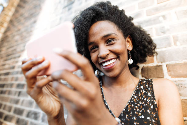 istock Young woman with mobile phone 860721686