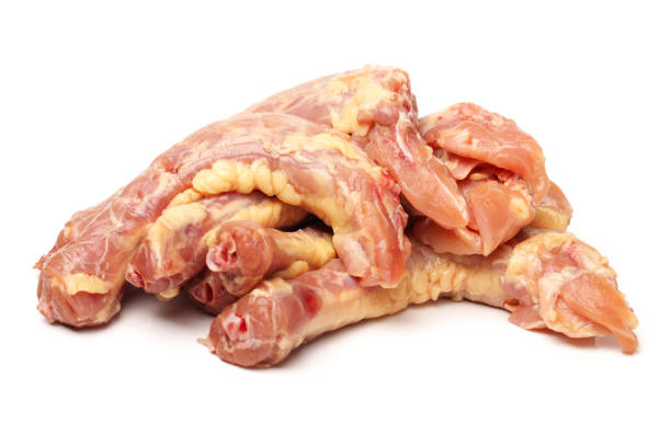 istock Chicken meat macro isolated on white background 860722234