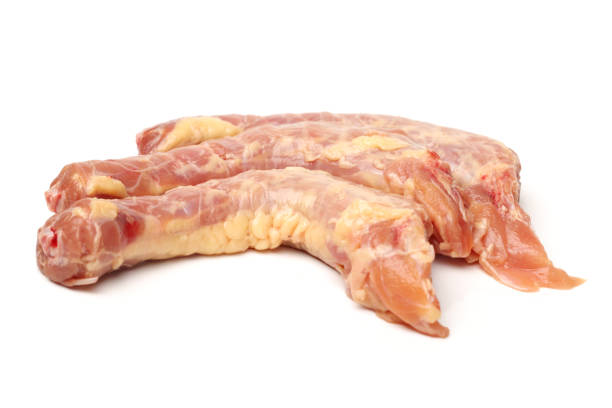istock Chicken meat macro isolated on white background 860722246