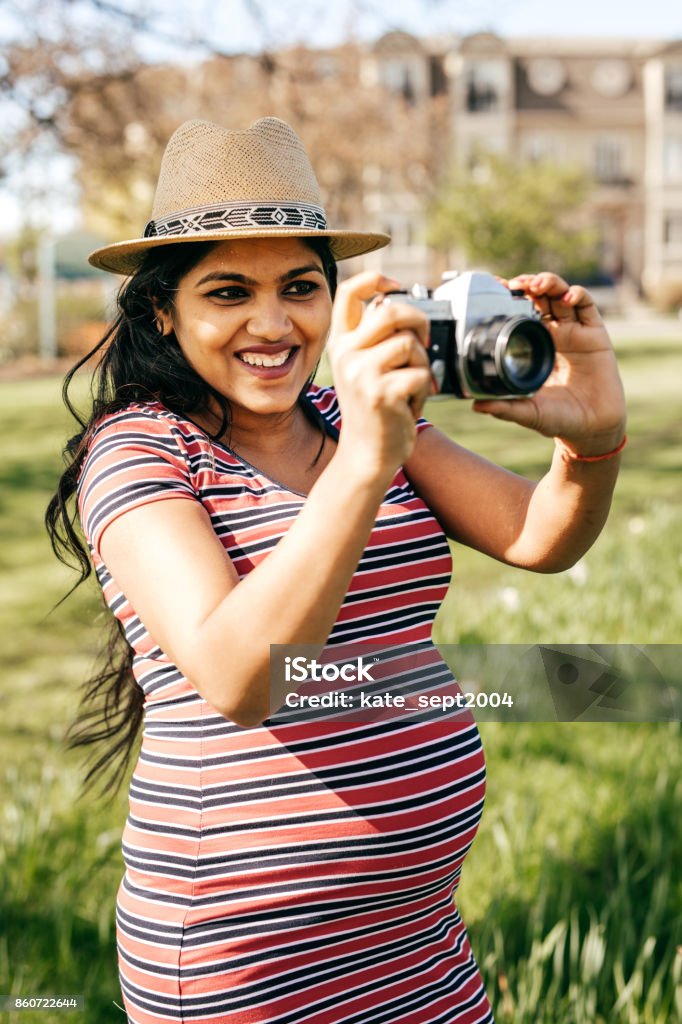 Pregnancy trimester Happy and pregnant woman Walking Stock Photo