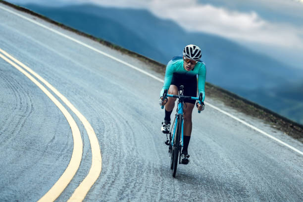 istock Cyclists are cycling, climbing up to the top. 860728450