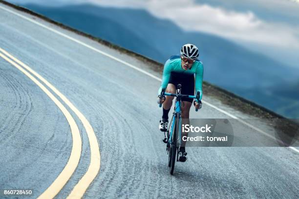 Cyclists Are Cycling Climbing Up To The Top Stock Photo - Download Image Now - Cycling, Sport, Bicycle