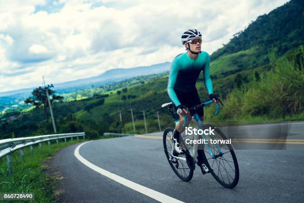 Cyclists Are Cycling Climbing Up To The Top Stock Photo - Download Image Now - Cycling, Bicycle, Climbing