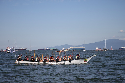 July 14, 2017. Canada. Vancouver.  Vanier Park. Gathering of Canoes, one of the signature events of Canada 150 celebration. During 10-day journey about 30 canoes with First Nations, Public Service Agencies and youth paddlers travel from the Sunshine Coast to the City of Vancouver and request permission to land on the traditional territories of the Musqueam, Squamish and Tsleil-Waututh First Nations.