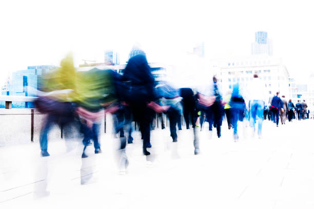 istock Blurred scene of crowded people are walking in rush 860742420