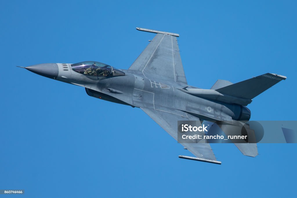 F-16 Fighting Falcon approaching at a very unusual close view Fighter Plane Stock Photo