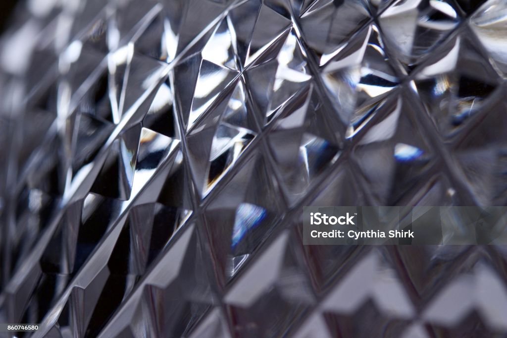 Macro Lead Crystal Facets Abstract Background This abstract background features an artistic defocused macro view of beautiful hand cut lead crystal facets Crystal Glassware Stock Photo