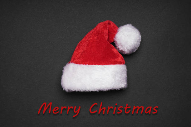 istock santa claus hat with merry christmas greeting 860750318