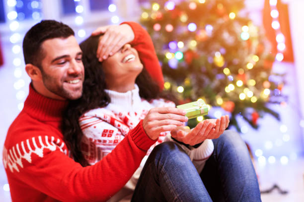 istock Couple having fun at home for Christmas 860757406