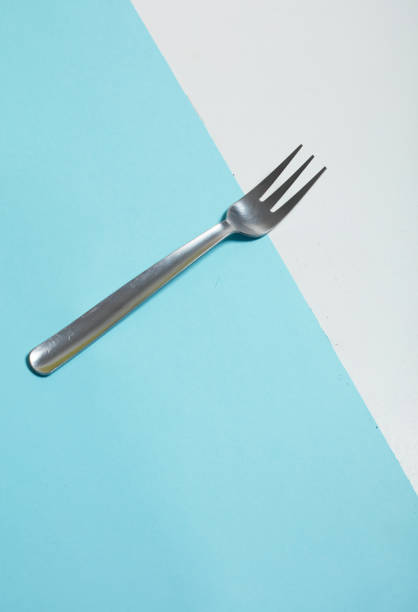 istock Metal silver cutlery, on the background of the patch 860757480