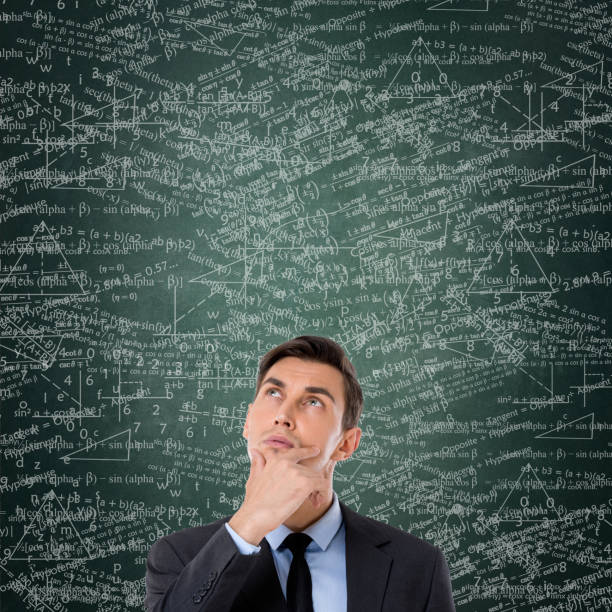 istock Thoughtful businessman in front of blackboard 860760216