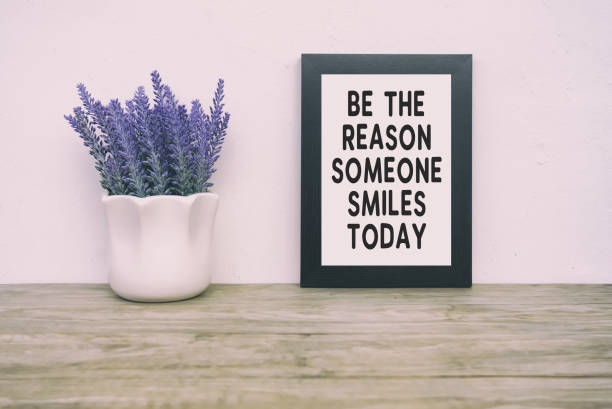 istock Inspirational Quotes - Be The Reason Someone Smiles Today 860764326