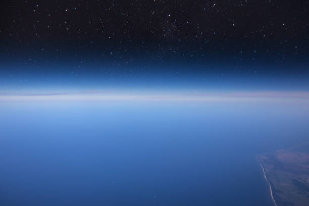 istock High altitude view between sky and space , in to the dark 860764486