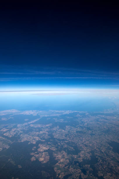 istock High altitude view between sky and space , in to the dark 860764494