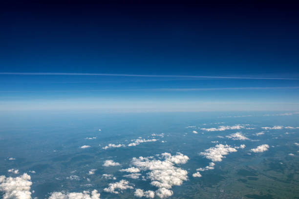 istock High altitude view between sky and space , in to the dark 860764528