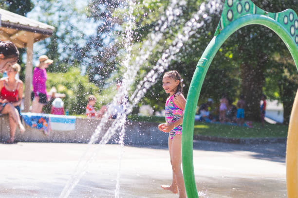 istock Summer afternoon at the splash pad 860770994
