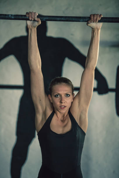 istock Young woman at the gym 860771074