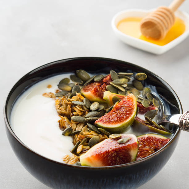 istock Healthy breakfast yogurt bowl with granola and fig 860776000