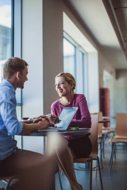 istock Business Couple on Coffee Break 860780314