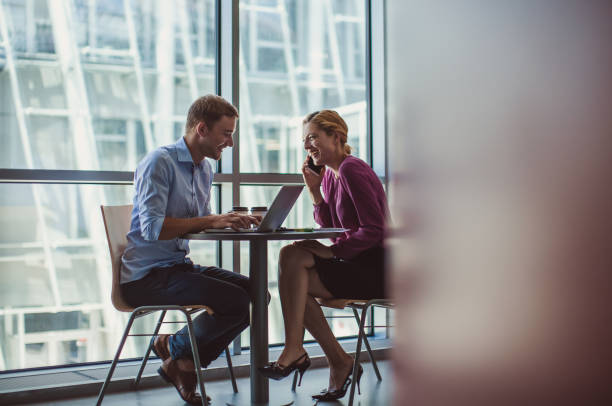 istock Business Couple on Coffee Break 860780342