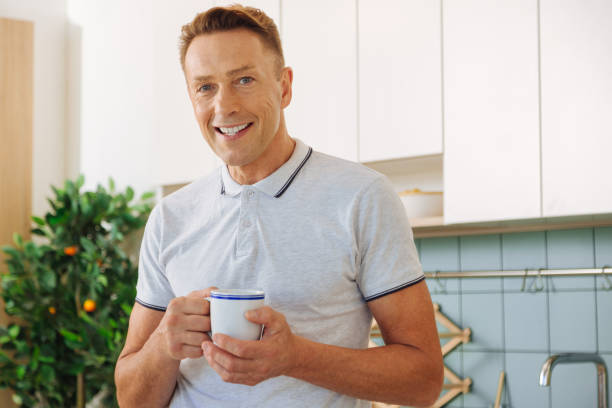istock Happy delighted man resting at home 860789988