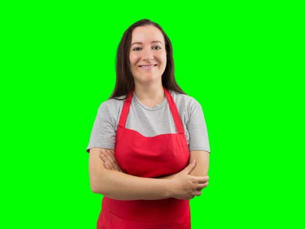istock woman with apron smiling 860790276