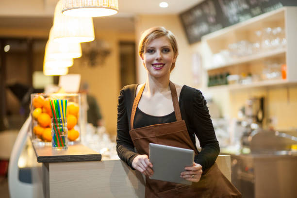 istock Young female bar owner portrait 860790578