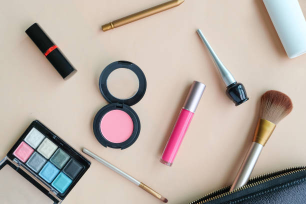 istock Various of Make Up Brushes on soft pink background. Pastel style. 860792874